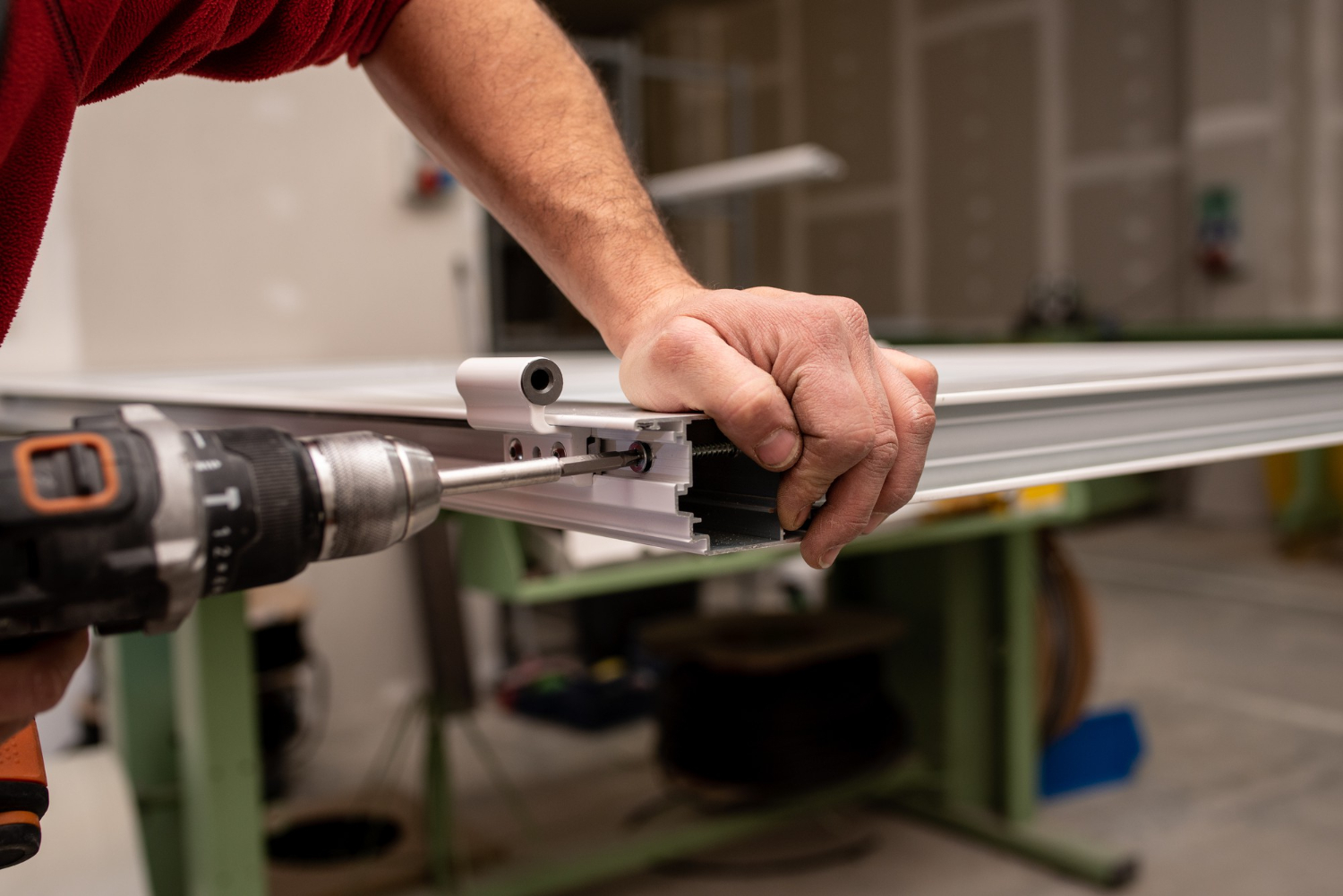 Technician fixing garage door springs