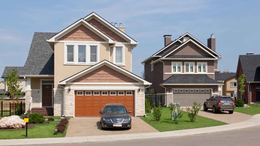 Two suburban homes with sectional garage doors